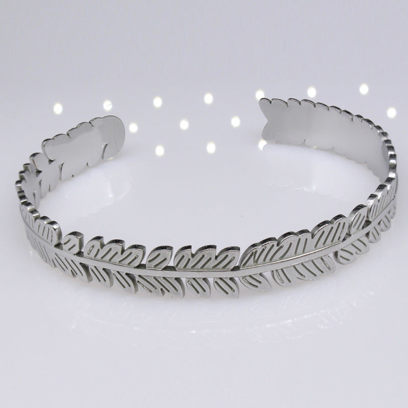 Hoja del árbol al por mayor C de forma de acero inoxidable ajustable brazalete de titanio